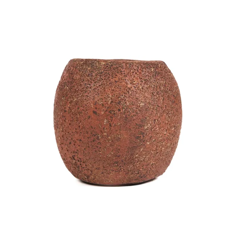 Brown terracotta candle holder on a white background