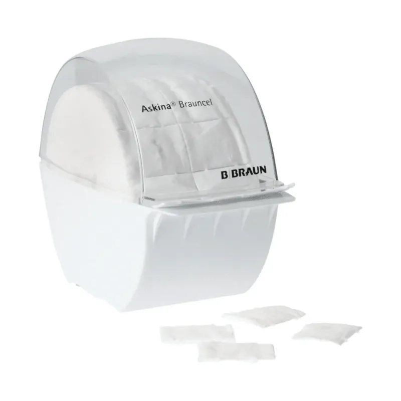 Ein B. Braun Askina® Brauncel® Spender für Zellstofftupfer - leer von B. Braun Deutschland GmbH & Co. KG ist ein weißer Kunststoffspender mit transparentem Deckel, der zur Aufnahme von Zellstofftupfer bestimmt ist. Davor erleichtern vier gleichartige Quadrate die hygienische Entnahme.