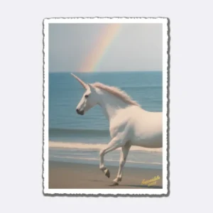Postkarte mit Einhorn am Strand und Regenbogen mit Schriftzug "Impossible Cards"