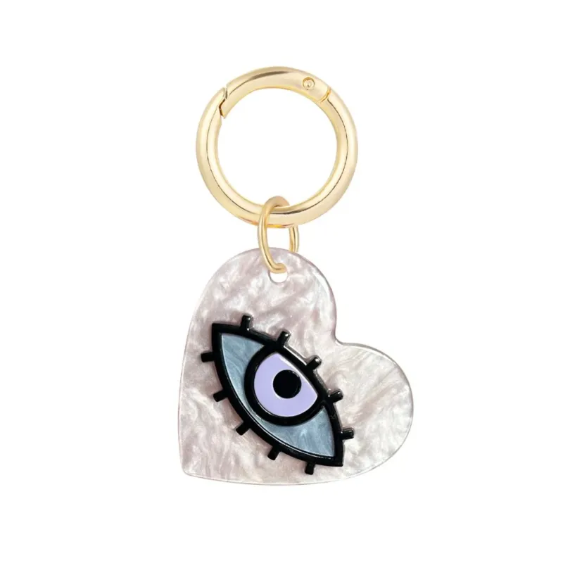 Herzförmiger Schlüsselanhänger 'Seeing Eye' weiß